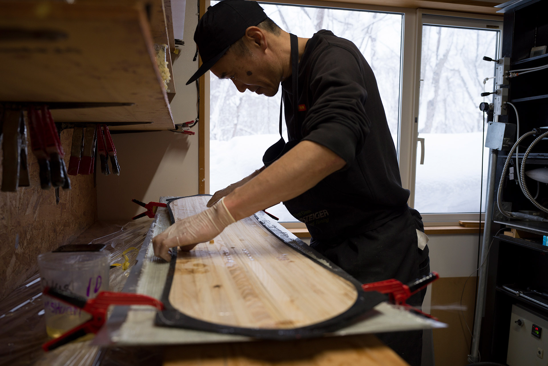 Laying the wood core onto the wet layup