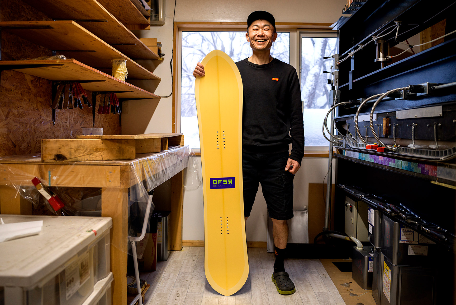 Tomohito Yamazaki with a finished board in the Offshore workshop