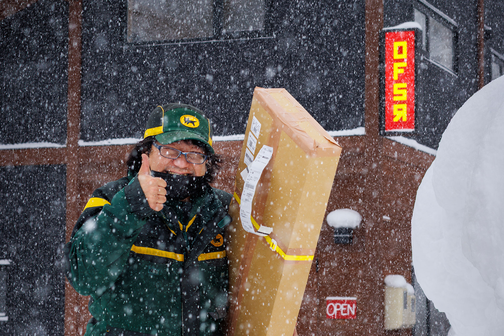 An Offshore board travelling, somewhere between Niseko and winter