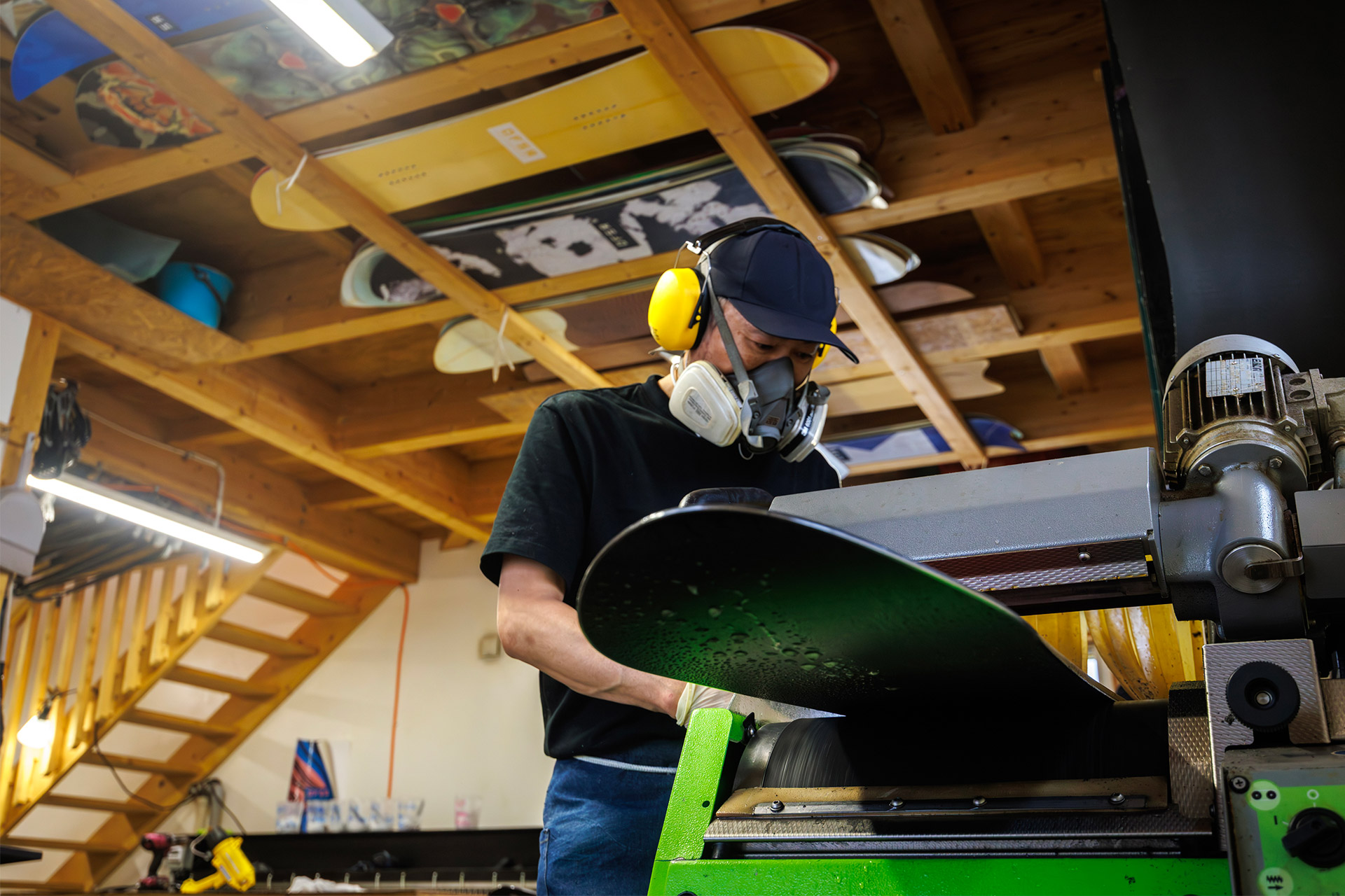 Feeding a board through the grinder