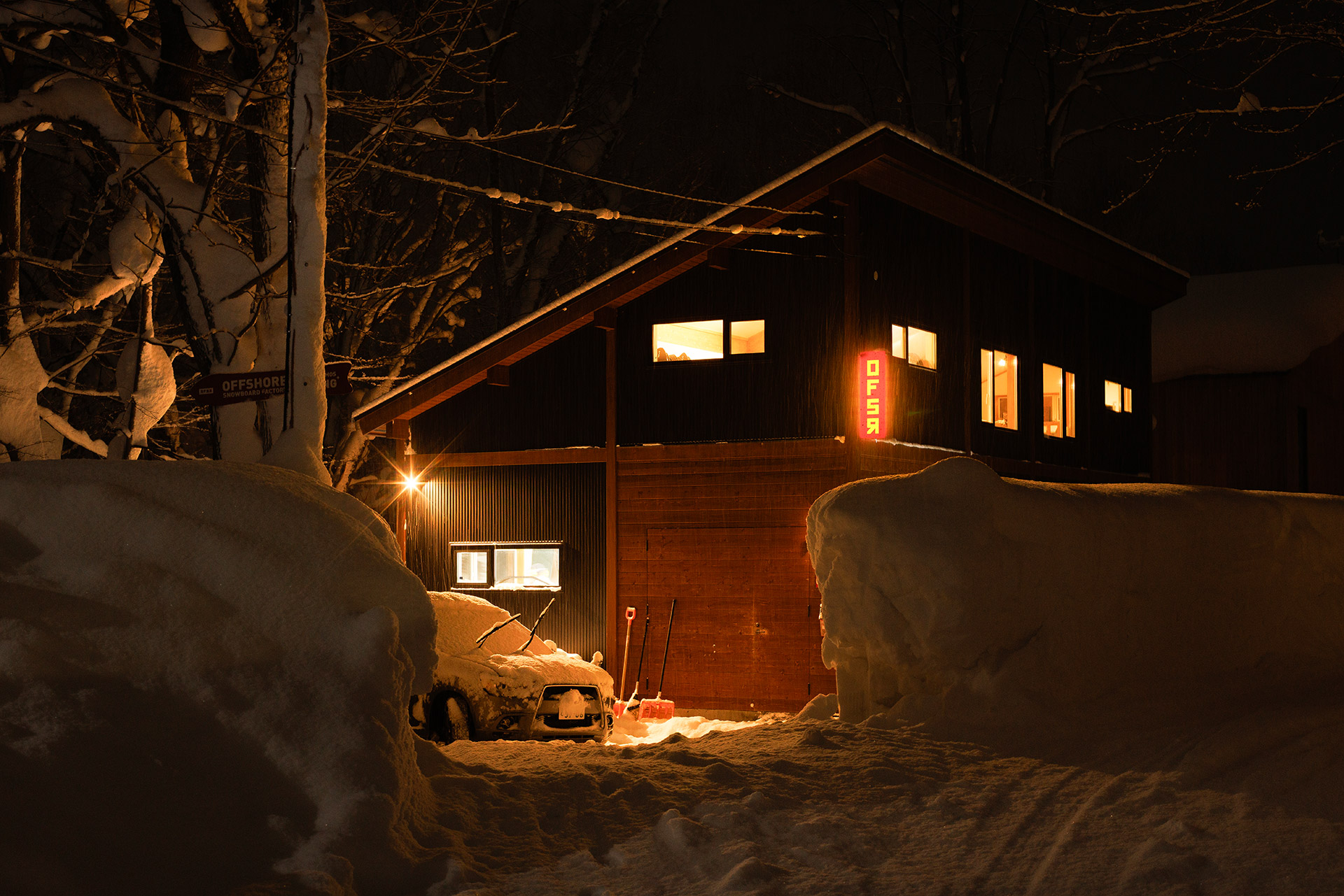 The Kōjō at night, lights on