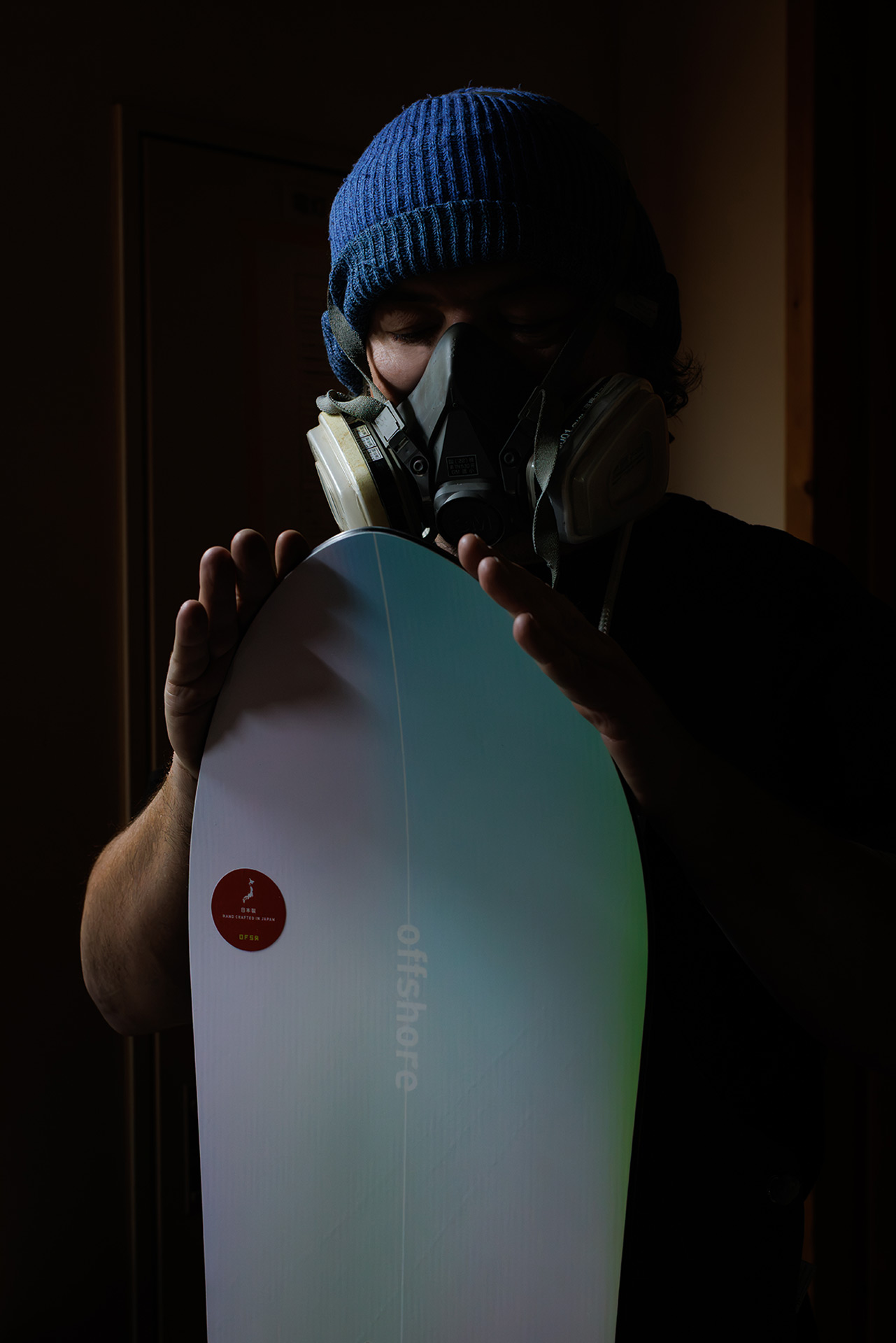 Josh shaping a board in the Kōjō, Niseko